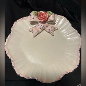 World Bazaar brand decorative ceramic plate with bow.